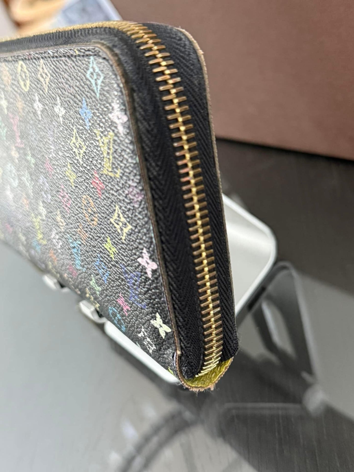 Multicolor Zippy Long Wallet in Black with Box , Dustbag and Paper bag Year: 2010