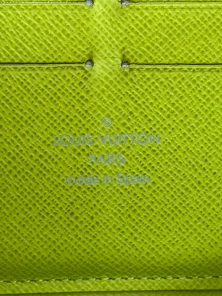 Multicolor Zippy Long Wallet in Black with Box , Dustbag and Paper bag Year: 2010