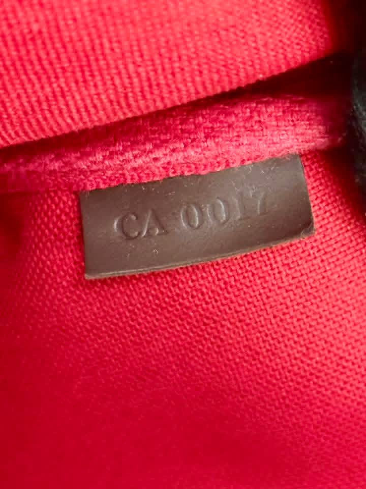 Pochette Accessories in DE with Non branded Strap 📅 Year: 2007