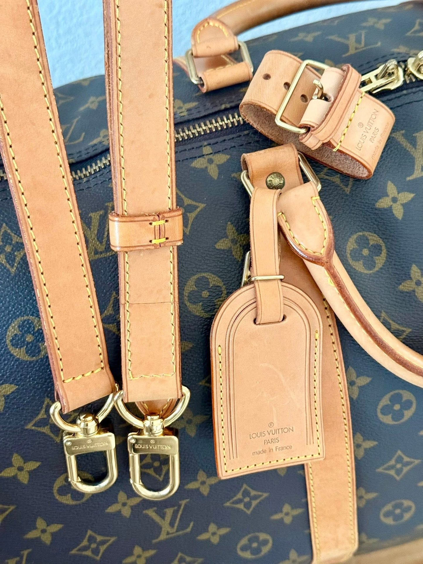 Keepall 60 Bandoulier with Original Strap, Luggage Tag and Poignet 📅 Year: 1994