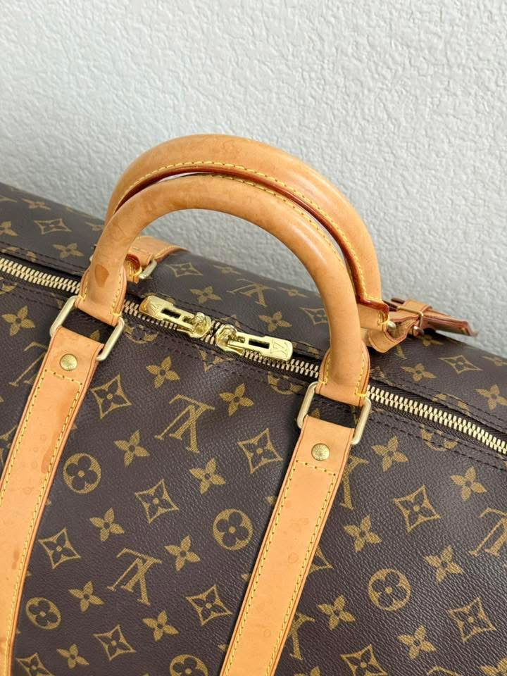 Keepall 55 Bandoulier with Original Strap, Luggage tag and Poignet 📅 Year: 2002