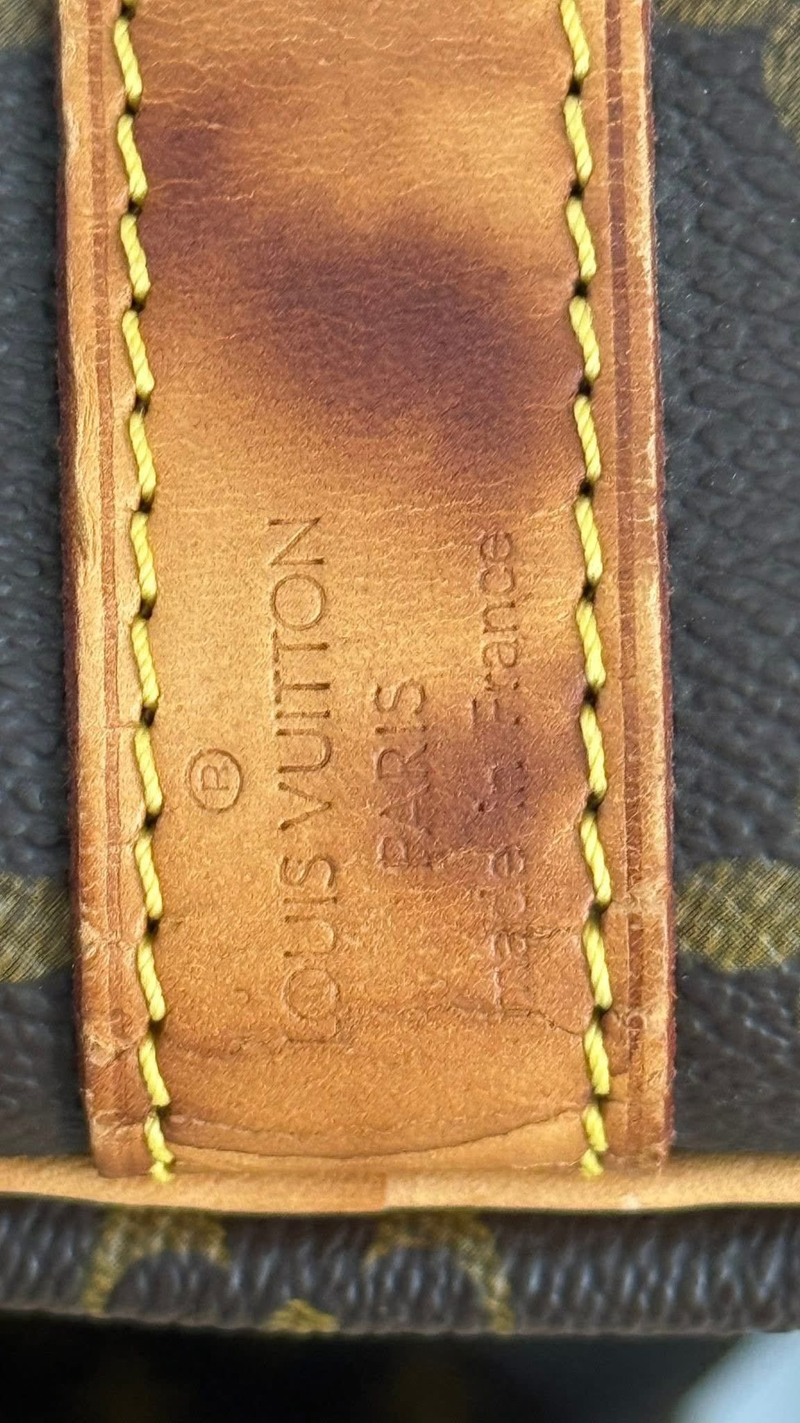 Keepall 55 Bandoulier with Original Strap, Luggage tag and Poignet 📅 Year: 2002