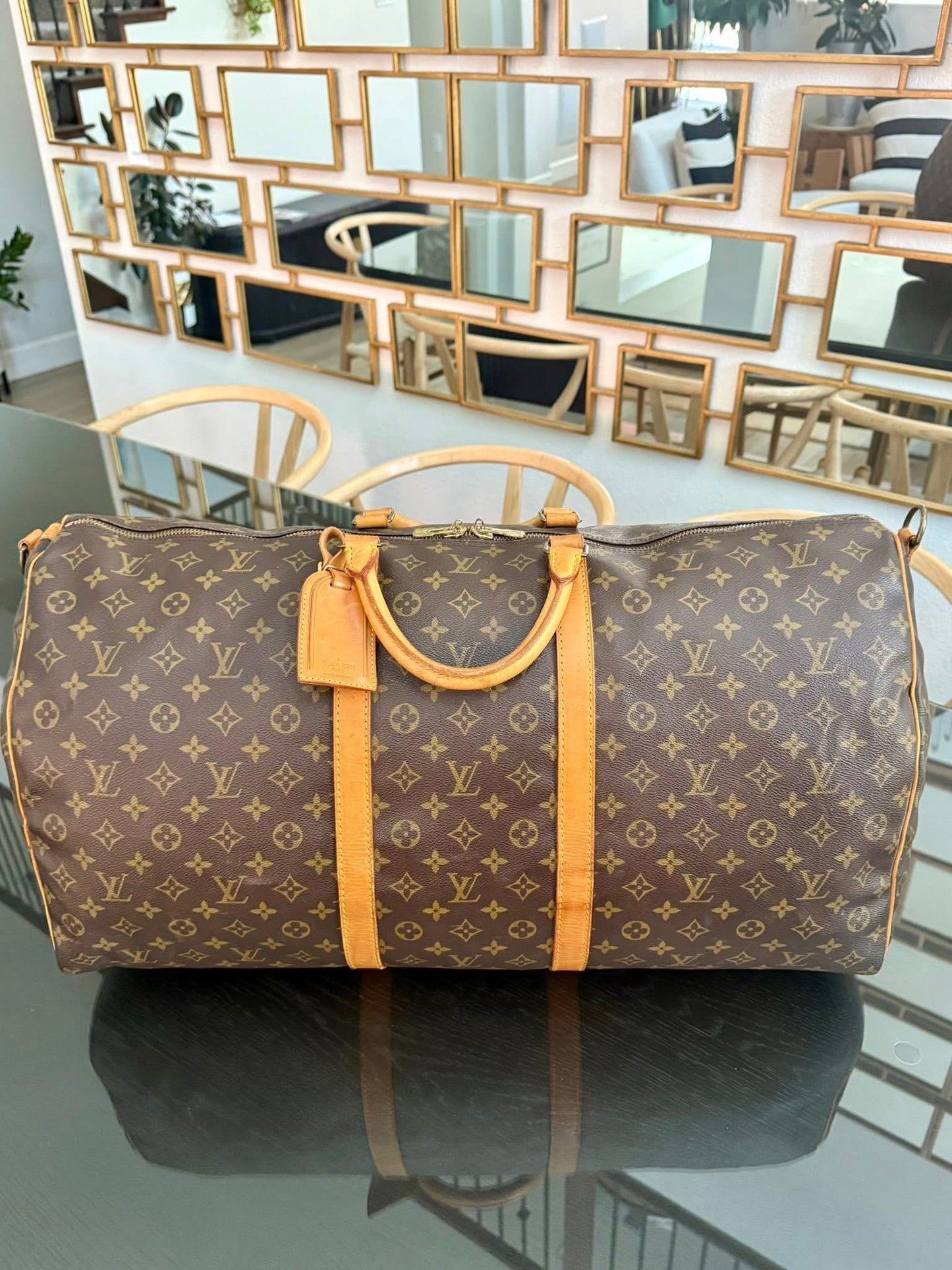 Keepall 60 Bandoulier with Original Strap, Luggage Tag and Poignet 📅 Year: 1991