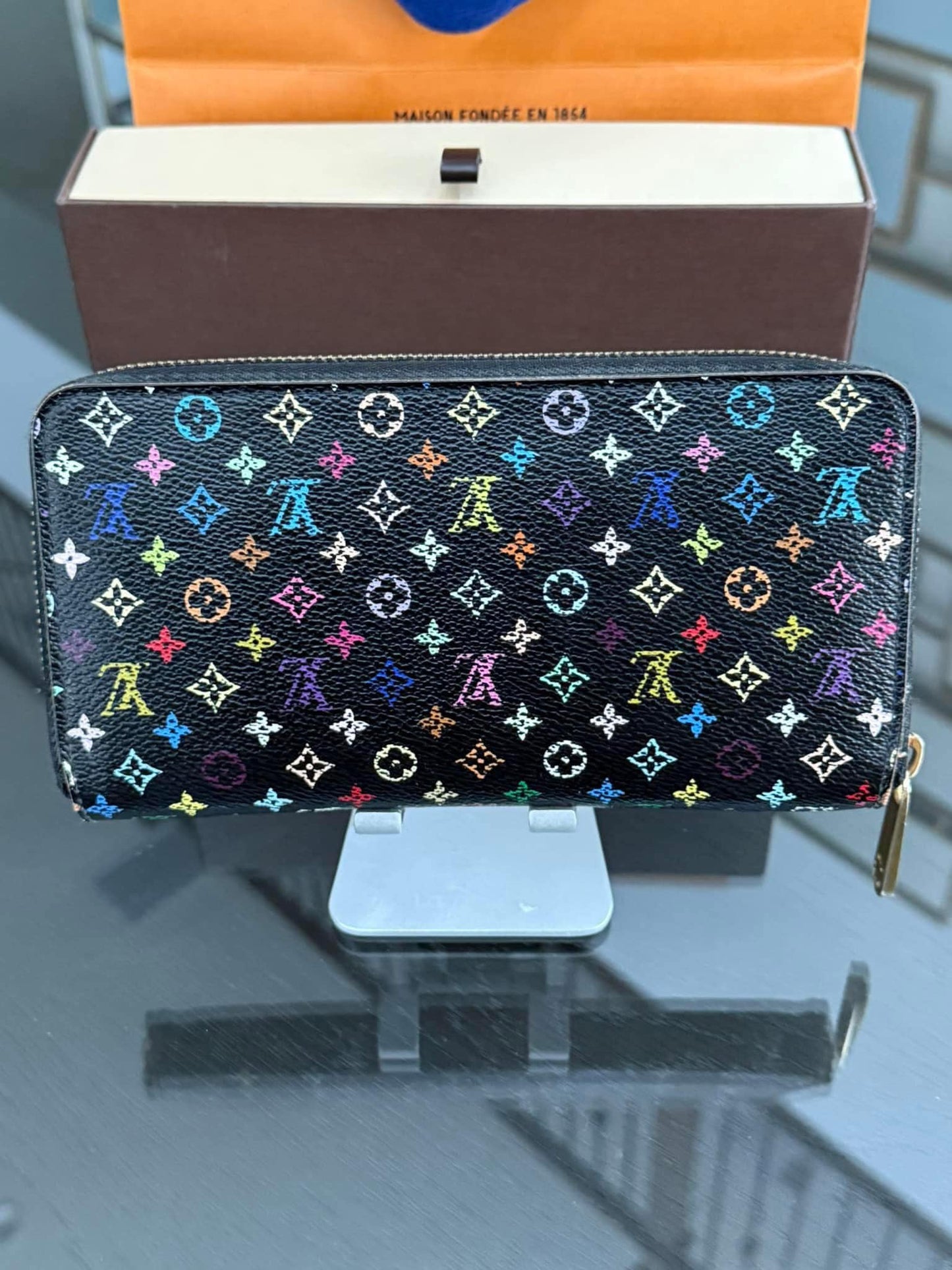 Multicolor Zippy Long Wallet in Black with Box , Dustbag and Paper bag Year: 2010