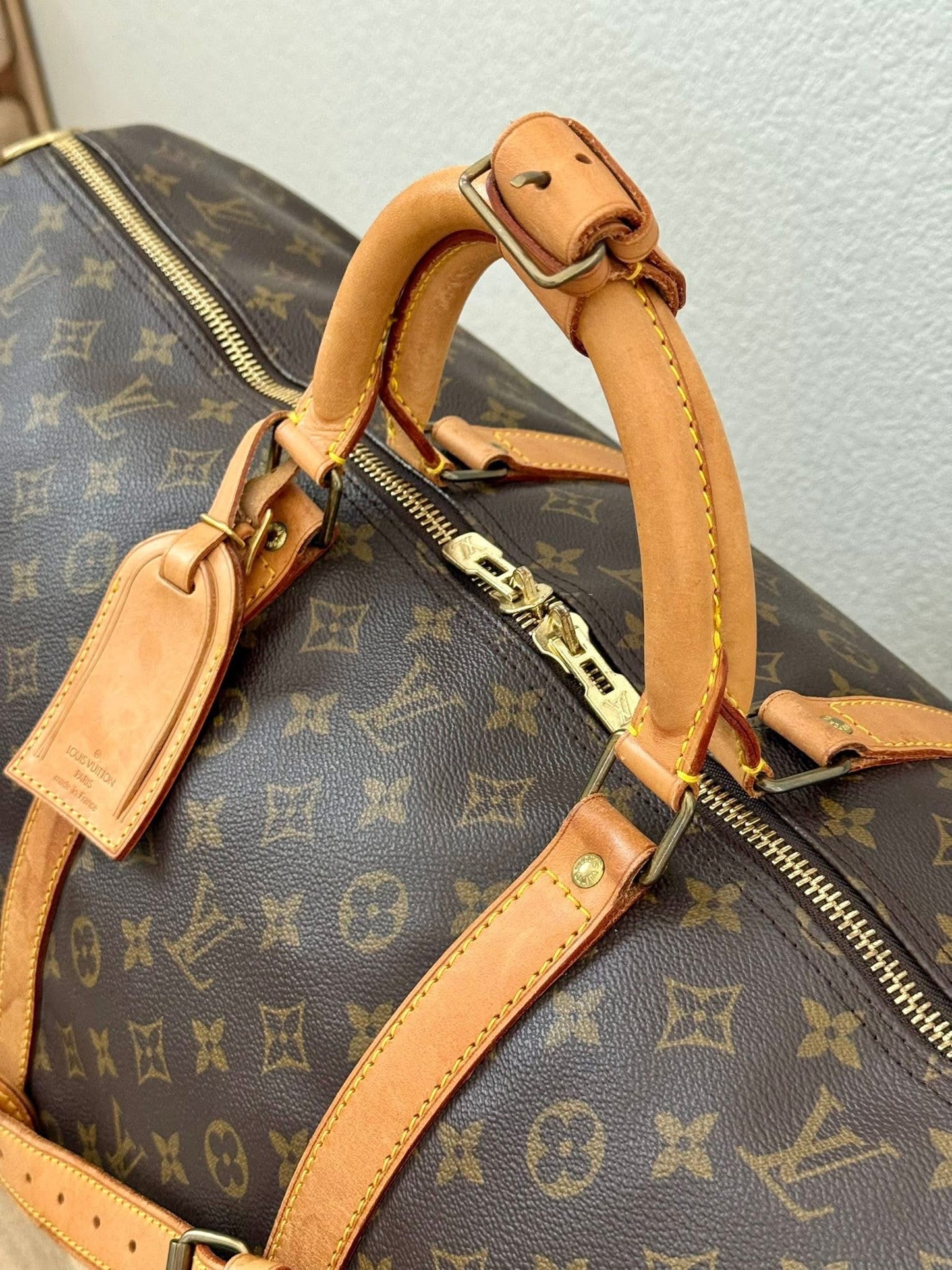 Keepall 60 Bandoulier with Original Strap, Luggage Tag and Poignet 📅 Year: 1991
