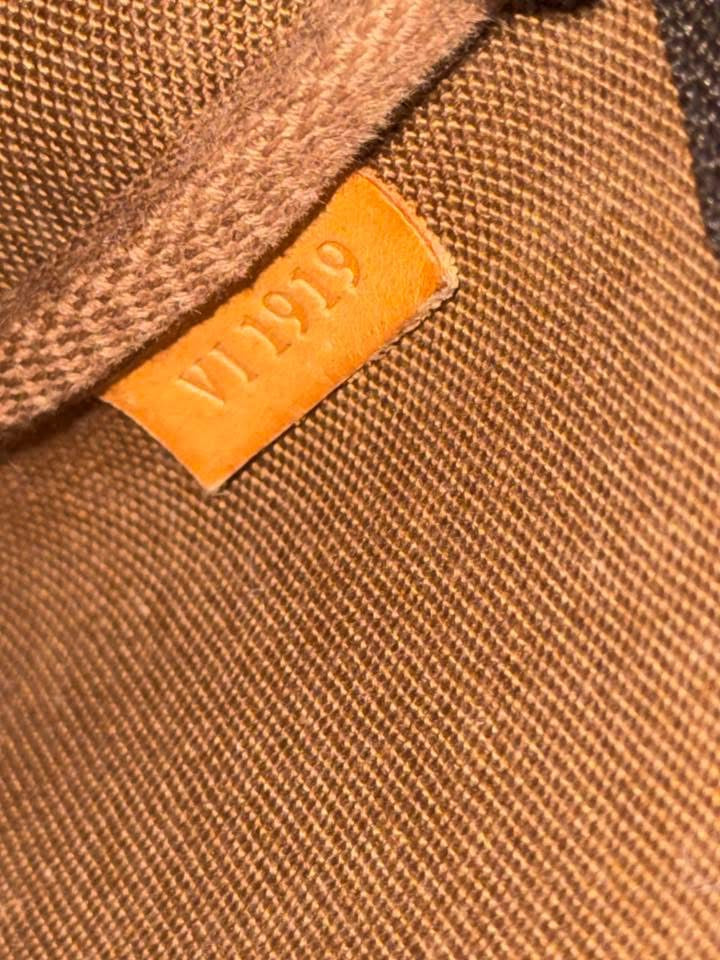 Pochette Accessories with Dustbag 📅 Year: 1999