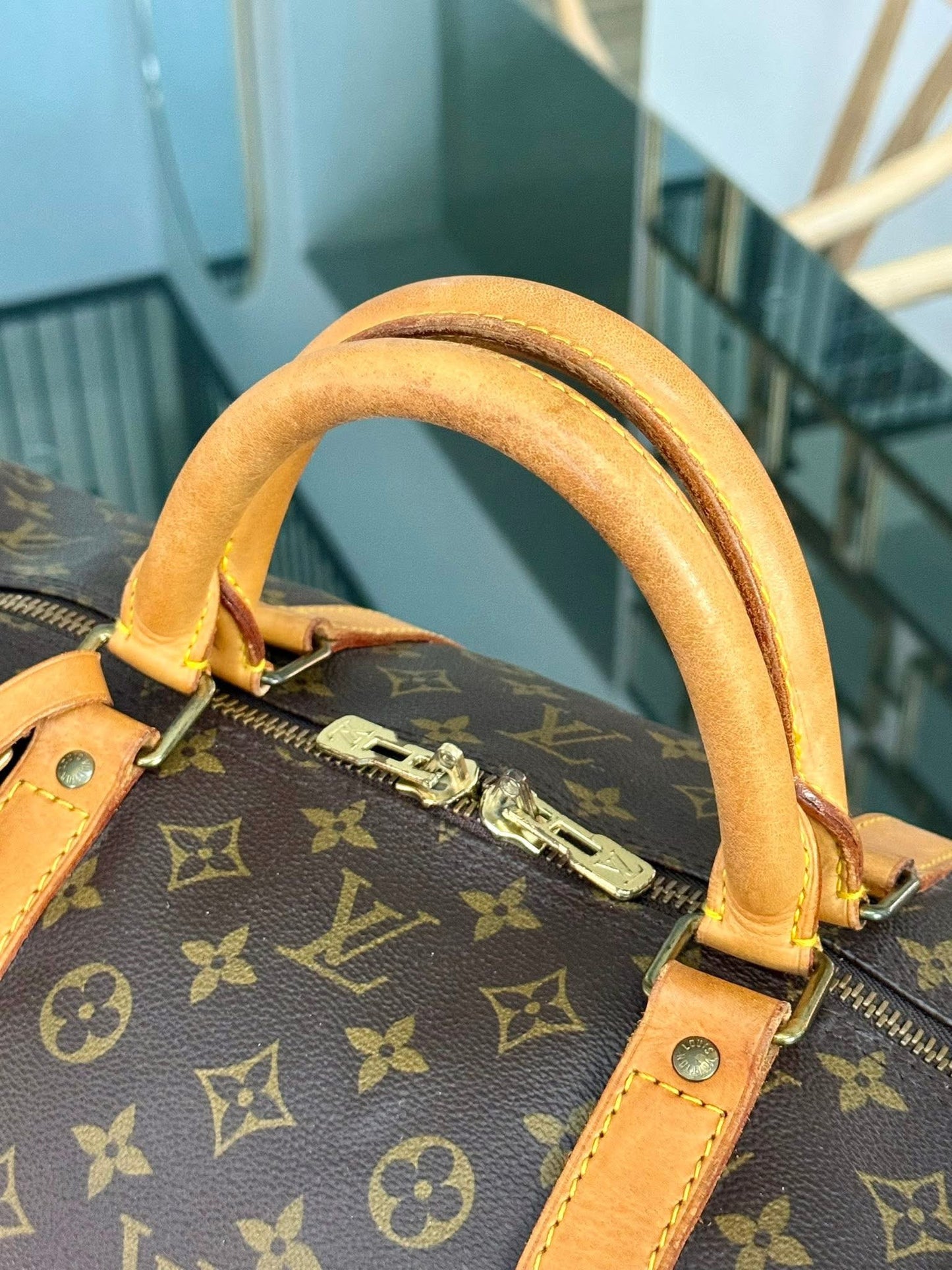 Keepall 60 Bandoulier with Original Strap, Luggage Tag and Poignet 📅 Year: 1991