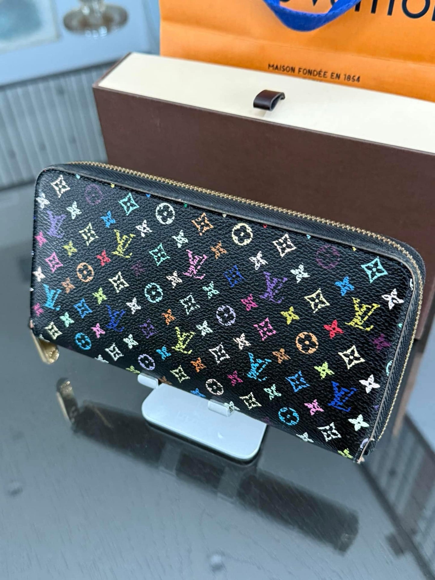 Multicolor Zippy Long Wallet in Black with Box , Dustbag and Paper bag Year: 2010