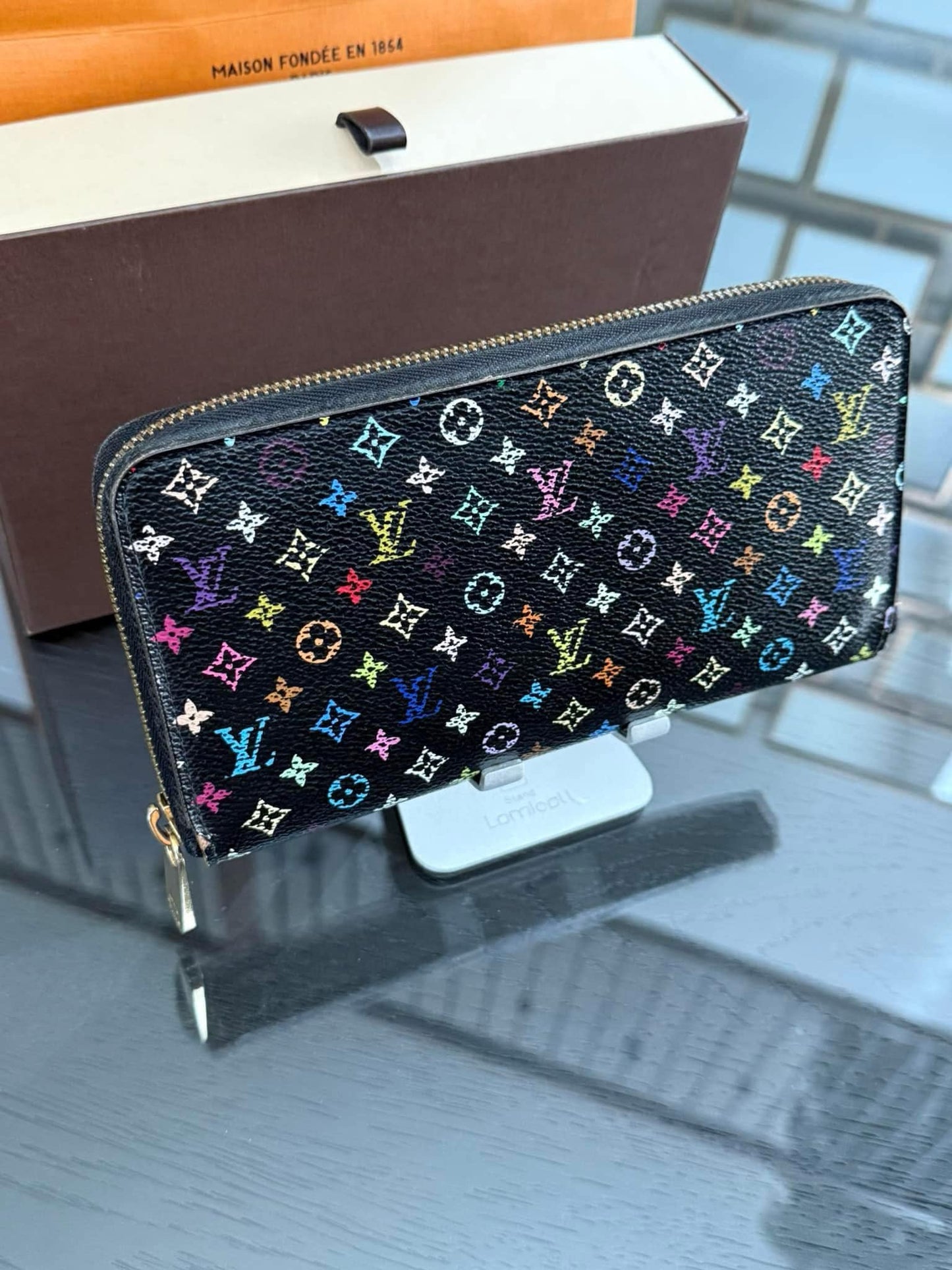 Multicolor Zippy Long Wallet in Black with Box , Dustbag and Paper bag Year: 2010