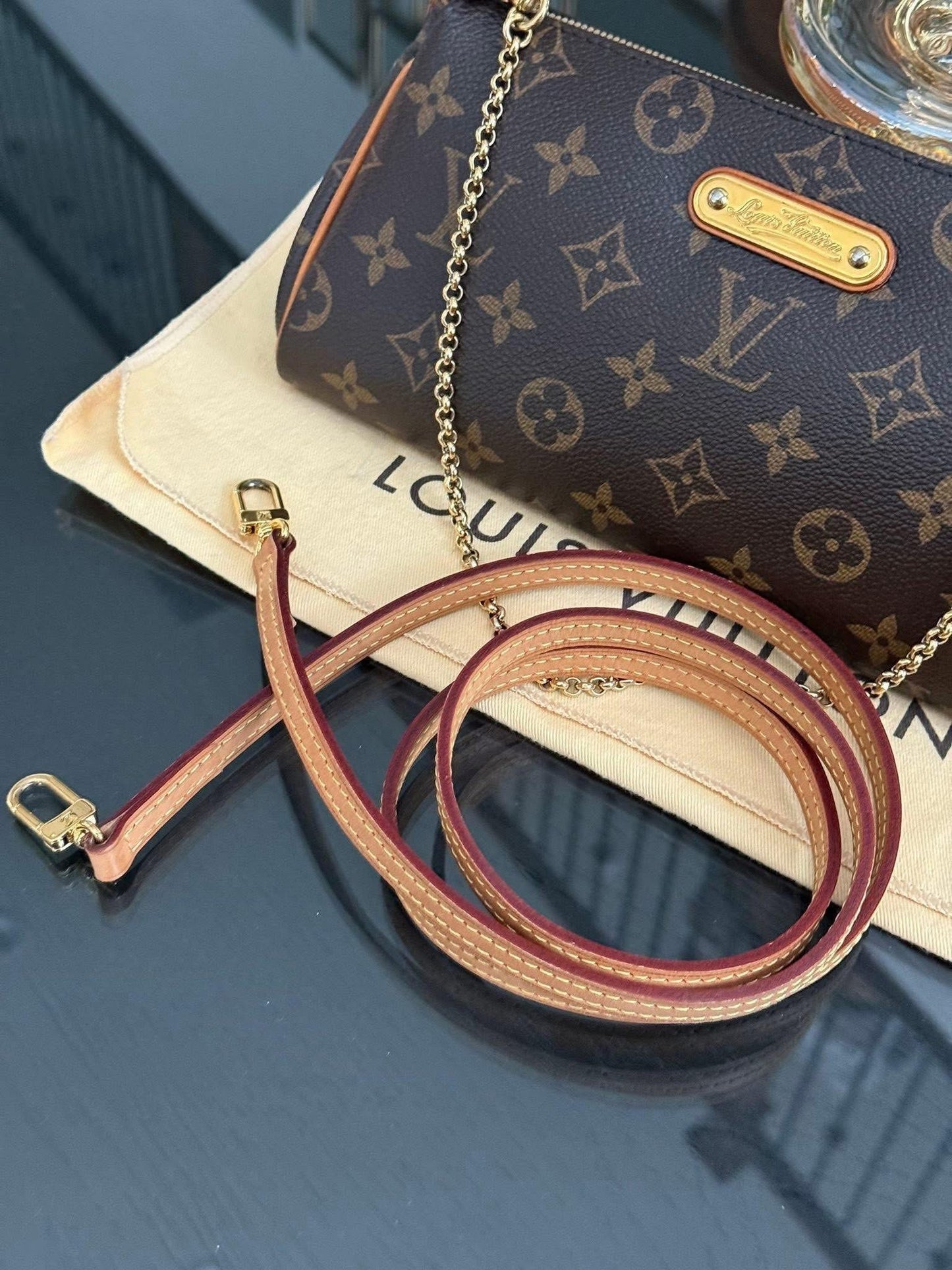 Eva Clutch in Monogram with Dustbag, Box and Paper bag 🗓️ Year: 2014