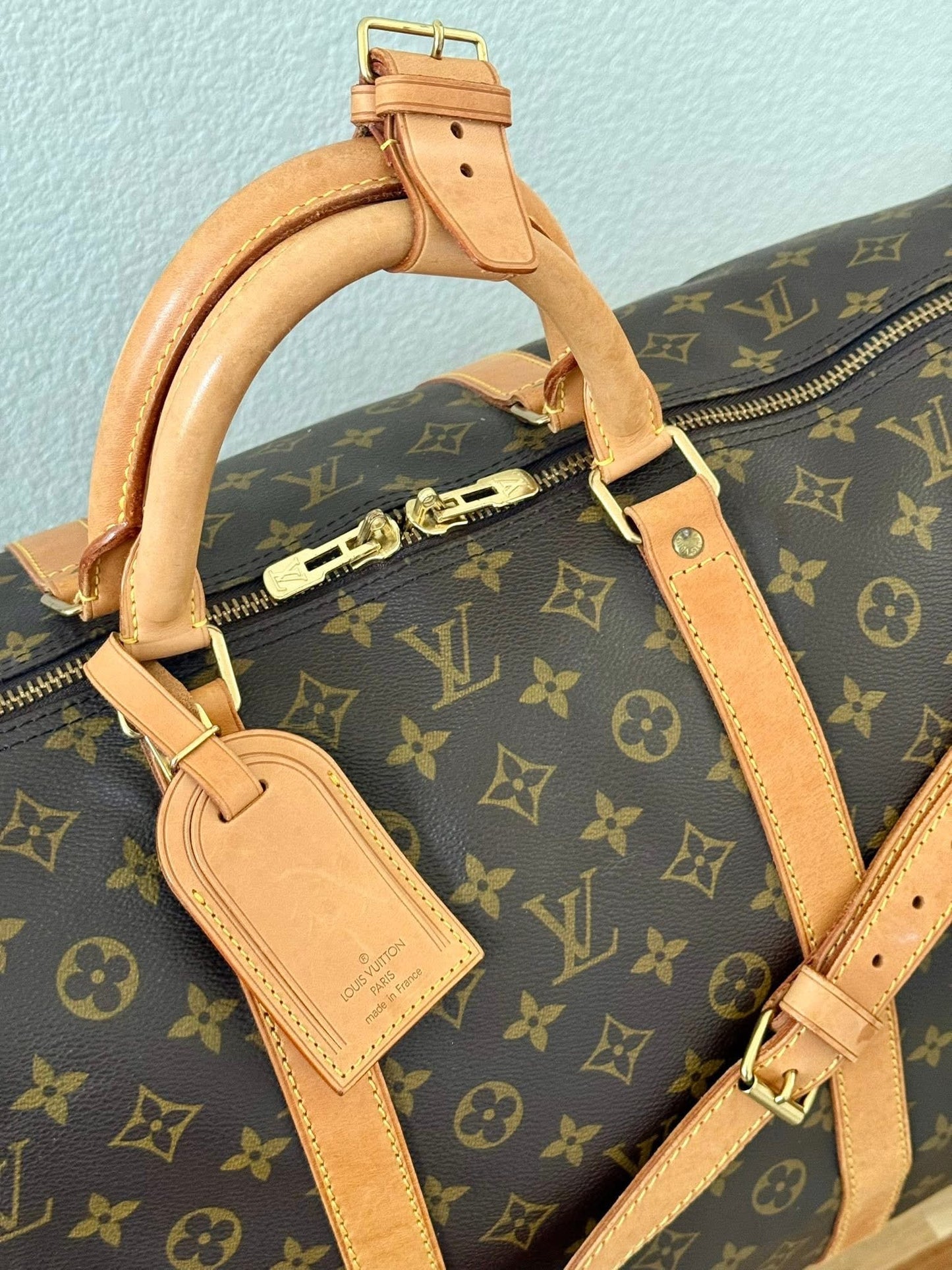 Keepall 60 Bandoulier with Original Strap, Luggage Tag and Poignet 📅 Year: 1994