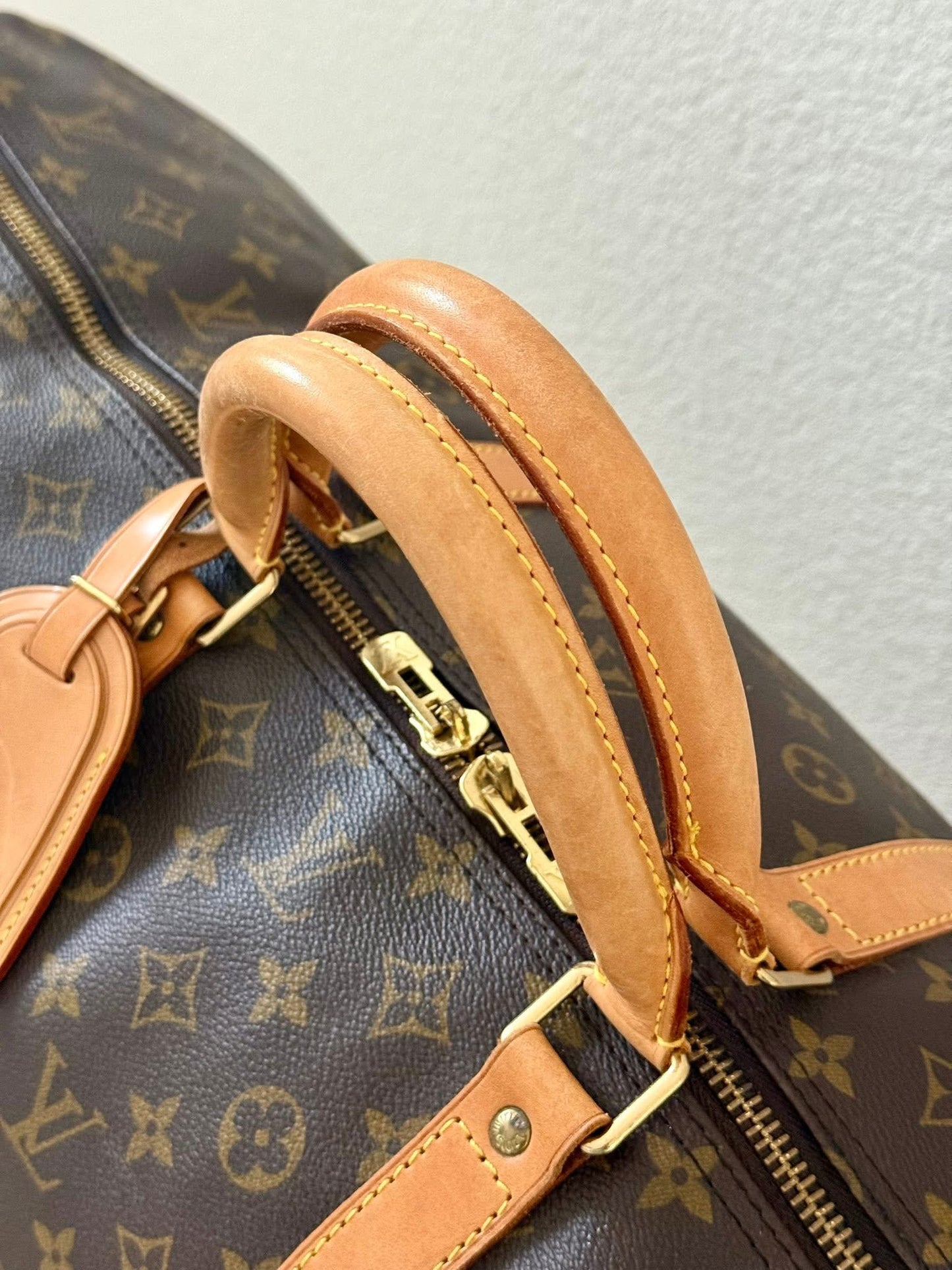 Keepall 60 Bandoulier with Original Strap, Luggage Tag and Poignet 📅 Year: 1994