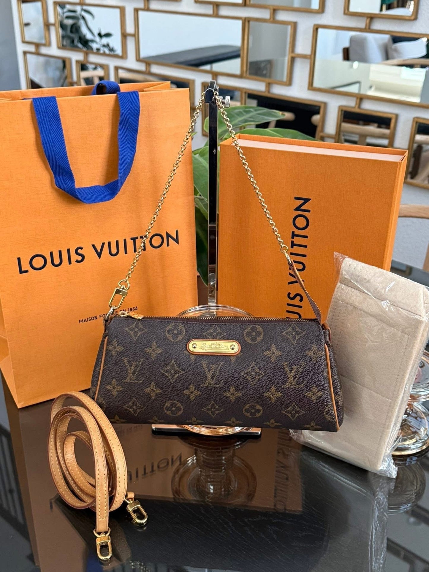 Eva Clutch in Monogram with Original Strap, Insert Organizer, Box and Paper bag 🗓️ Year: 2010